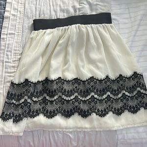 Women’s off white and black lace skirt